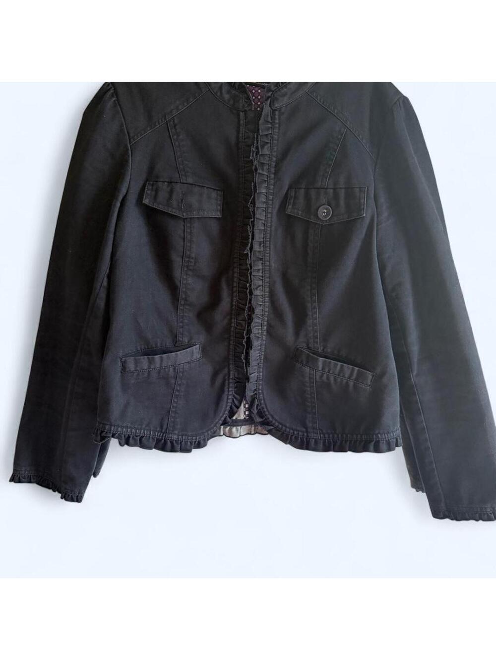 Black ruffle jacket with button-up front and pockets, size 6. Cotton blend
